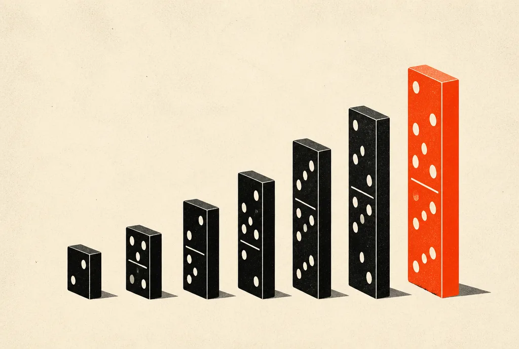 Flat editorial illustration: black dominoes rising in height toward a final tall red-orange domino.